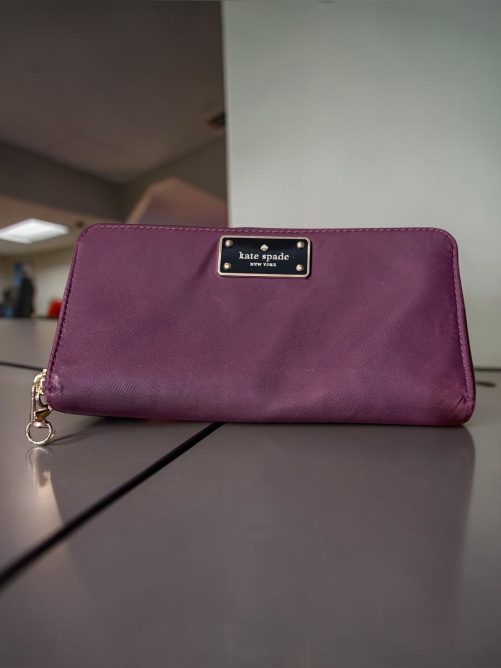 kate spade Plum Zip-Around Wallet with Gold Hardware